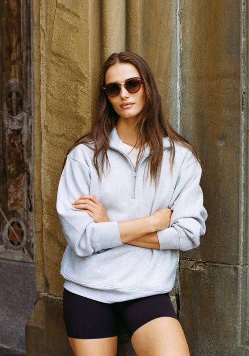 ASHTON | Brandy Silver Handcrafted, luxury burgundy acetate round KREWE sunglasses with silver stainless steel hardware womens model | Model: Sam