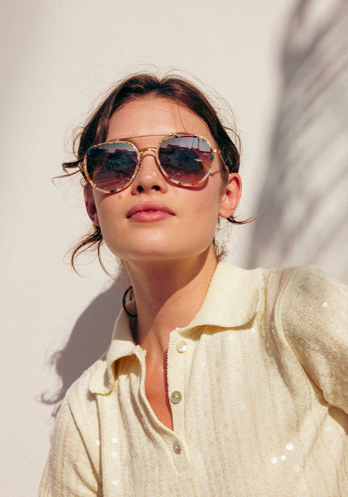 BAKER | 18K Titanium + Gelato Mirrored Handcrafted, luxury titanium and multicolored acetate aviator KREWE sunglasses with multicolored acetate temple tips womens model campaign | Model: Kennidy