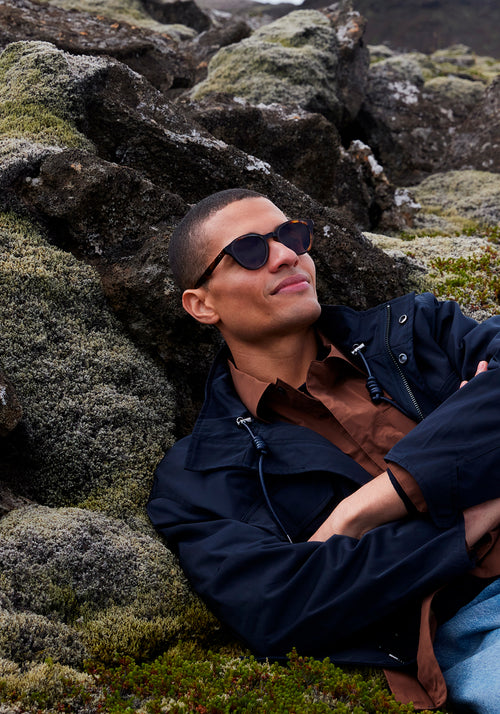 BARRETT | Havana Handcrafted, luxury brown tortoise acetate round KREWE sunglasses mens model | Model: Vincent