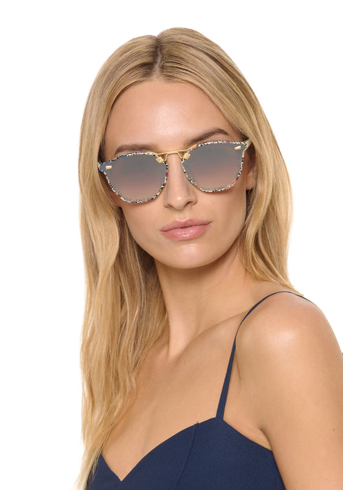 BEAU NYLON | Granita 18K Mirrored Handcrafted, luxury, speckled multicolored square acetate with gold bridge and hardware and flat edge to edge nylon lens KREWE sunglasses womens model | Model: Isabelle