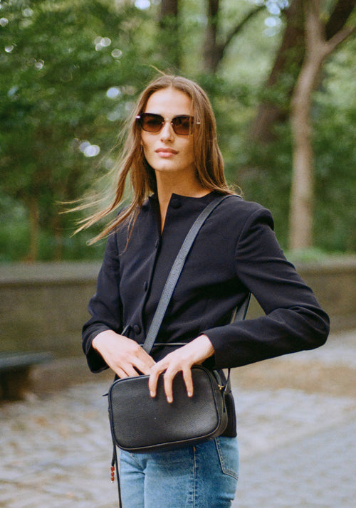 BELLA | 12K + Black + Black Tea Handcrafted, luxury black acetate and stainless steel cat-eye KREWE sunglasses womens model | Model: Sam