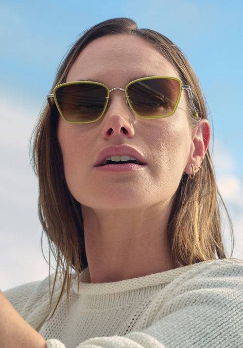 BELLA | Silver + Chartreuse Handcrafted, luxury yellow green and stainless steel cat-eye KREWE sunglasses womens model campaign | Model: Emily