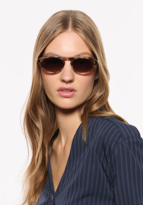 BILLIE | Blush Tortoise Handcrafted, luxury brown and pink tortoise acetate round aviator KREWE sunglasses womens model | Model: Isa