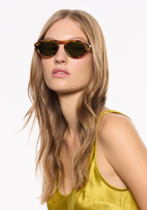 BILLIE | Calico Handcrafted, luxury brown tortoise acetate round aviator KREWE sunglasses womens model | Model: Isa