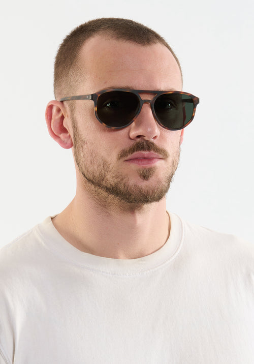 BRANDO | Matte Hickory Handcrafted, luxury brown tortoise acetate KREWE sunglasses mens model | Model: Connor