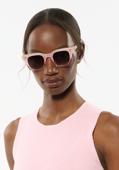 CELESTE | Sparkling Rosé Handcrafted, luxury light pink acetate medium sized square KREWE sunglasses womens model | Model: Brenda