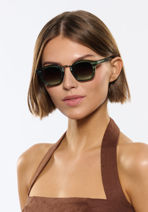 CAMPBELL | Reed 18K Handcrafted, luxury green tortoise acetate medium round KREWE sunglasses with stainless steel metal hardware womens model | Model: Michelle