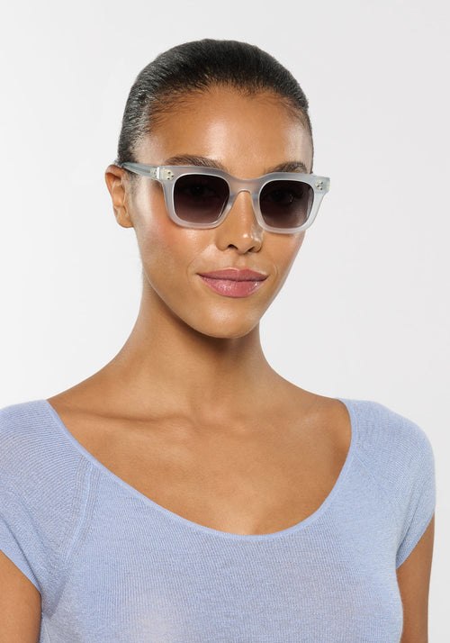 CELESTE | Handcrafted, luxury powder blue medium sized square cat eye KREWE sunglasses womens model | Model: Sasha