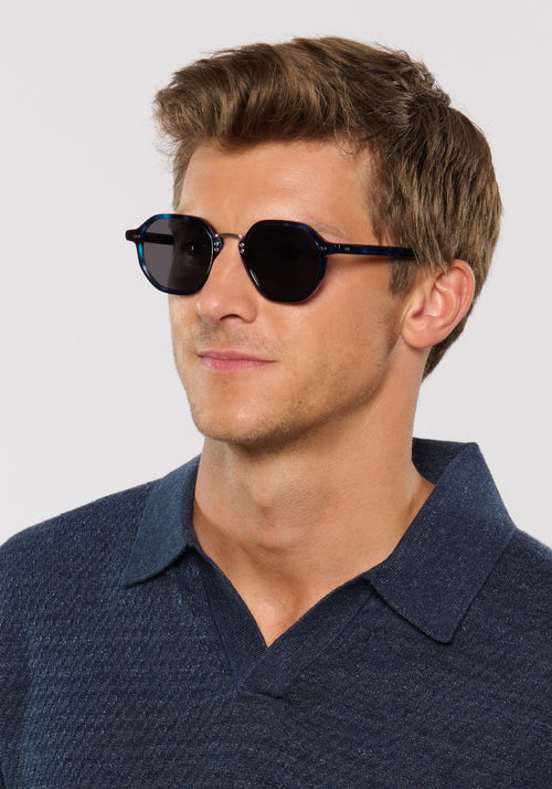 DAKOTA | Indigo Tortoise Silver Polarized Handcrafted, luxury, dark blue tortoise acetate polarized KREWE sunglasses with silver bridge and hardware mens model | Model: Ben
