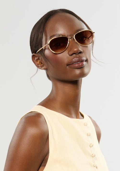 DALLAS | 12K Titanium + Champagne Handcrafted, luxury champagne yellow acetate KREWE aviator sunglasses with gold plated titanium hardware womens model | Model: Brenda