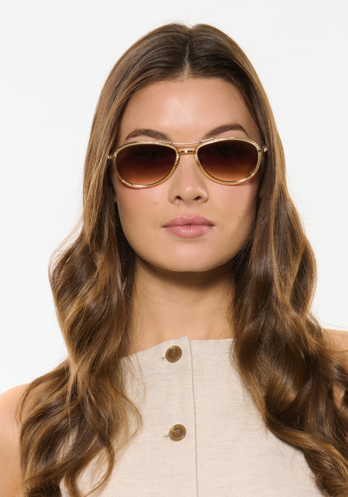 DALLAS | 12K Titanium + Champagne Handcrafted, luxury champagne yellow acetate KREWE aviator sunglasses with gold plated titanium hardware womens model | Model: Kennidy