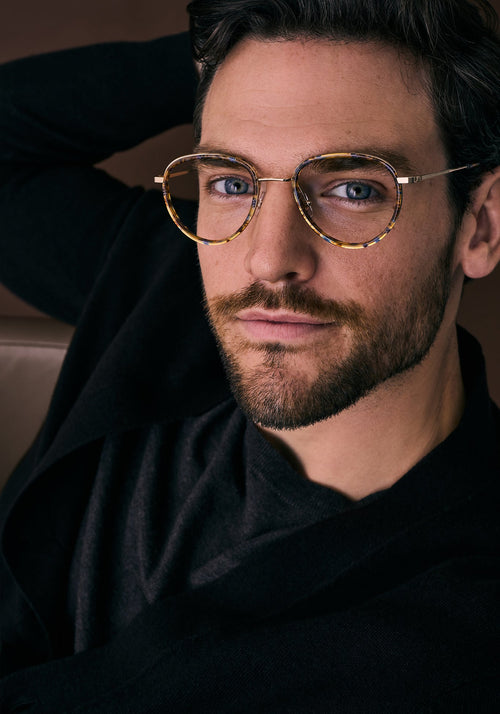 EMERSON | 12K Titanium + Heron Handcrafted, luxury multicolored acetate and metal teardrop aviator KREWE eyeglasses mens model campaign | Model: Jeff