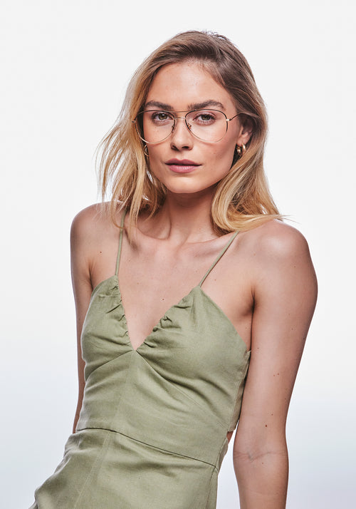 HARPER | 18K Matte Black Fade + Poppy Noir Handcrafted, luxury stainless steel aviator KREWE eyeglasses with multicolored acetate temple tips womens model | Model: Meghan