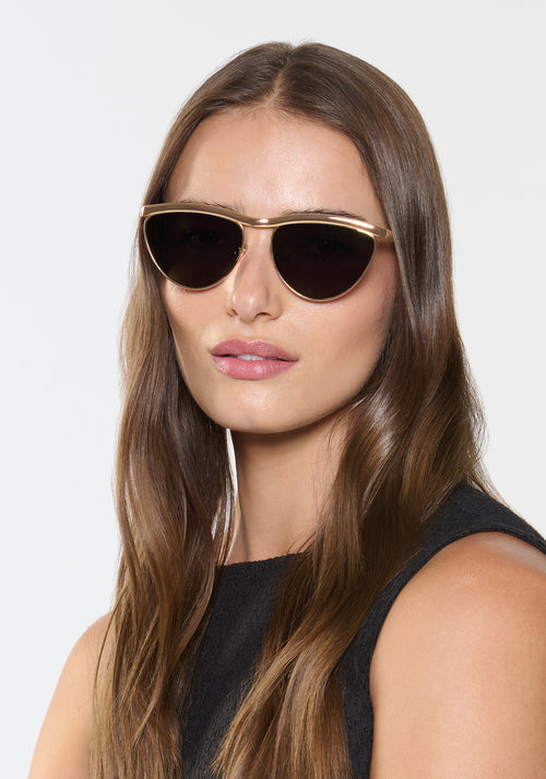 HEIDI | 18K Chroma + Havana Handcrafted, luxury gold chroma stainless steel large cat eye KREWE sunglasses womens model | Model: Sam