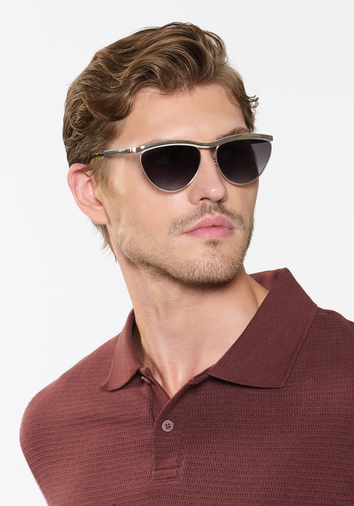 HEIDI | Silver Chroma + Tortuga Noir Handcrafted, luxury silver chroma stainless steel large cat eye KREWE sunglasses mens model | Model: Linus
