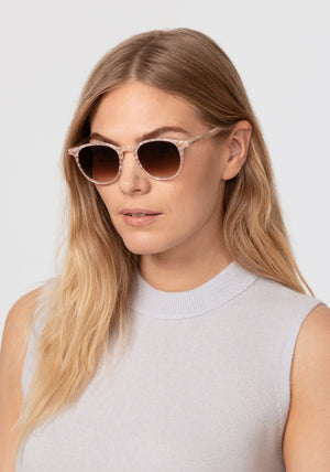 LANDRY | Micro Plaid Handcrafted, luxury light pink and white checkered acetate KREWE sunglasses womens model | Model: Maritza