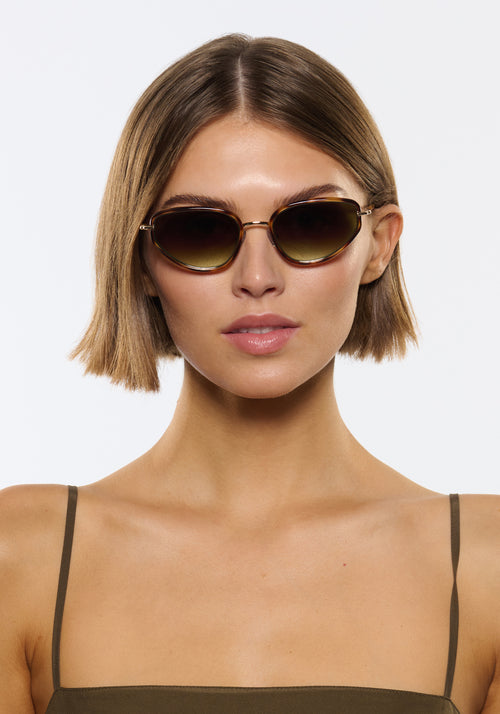 LEAH | 18K + Maple Handcrafted, luxury brown tortoise acetate and stainless steel cat-eye KREWE sunglasses womens model | Model: Michelle