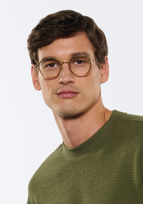 KREWE - LEIGHTON | 12K Titanium + Wasabi handcrafted, luxury green gradient octagonal eyeglasses with 12K gold plated metal hardware mens model campaign | Model: Jegor