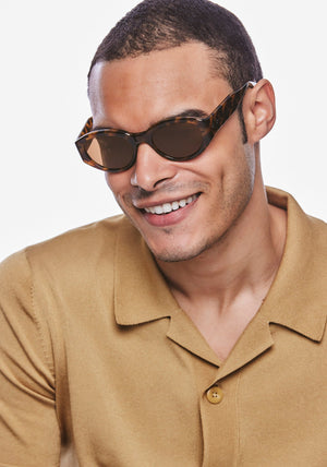 LUCY | Venezia Handcrafted, luxury dark brown tortoise acetate medium sized oval wrap KREWE sunglasses mens model | Model: Jeffrey