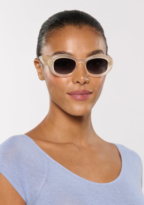 MARGARET | Platinum Blonde Handcrafted, luxury cream white acetate medium sized oval bubble frame KREWE sunglasses womens model | Model: Sasha