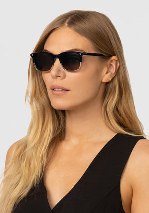 MATTHEW | Comet + Twilight Handcrafted, luxury navy and light brown acetate KREWE sunglasses mens model | Model: Maritza