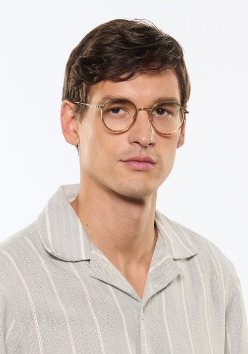 MAYFAIR | 12K Titanium + Wasabi Handcrafted, luxury green acetate and titanium round KREWE eyeglasses mens model | Model: Jegor