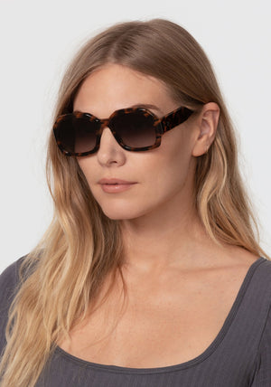 NAOMI | Venezia Handcrafted, luxury dark brown and black tortoise acetate oversized geometric wrap KREWE sunglasses womens model | Model: Maritza