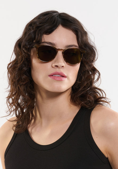 OLIVIER | Kombu Handcrafted, luxury brown acetate round KREWE sunglasses womens model | Model: Ione