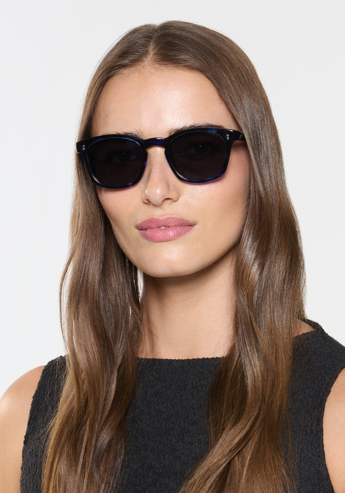 PARKER | Indigo Tortoise Handcrafted, luxury dark blue tortoise acetate square wayfarer KREWE sunglasses womens model | Model: Sam