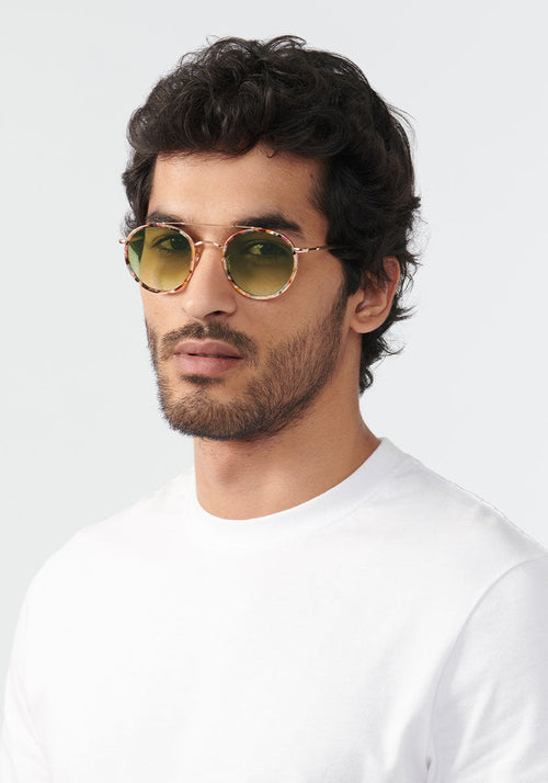 KREWE SUNGLASSES - PORTER | 18K Titanium + Capri + Petal + Custom Vanity Tint handcrafted luxury round colorful sunglasses with green tinted lenses mens model | Model: Mo