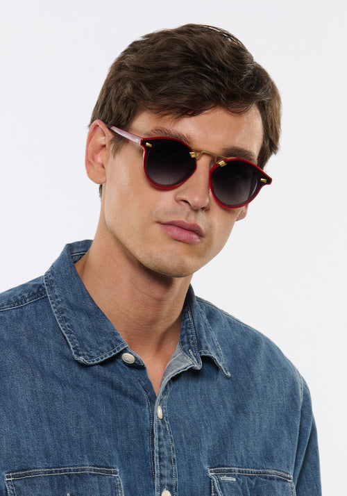 STL NYLON | Cherry 18K Handcrafted, luxury red cherry acetate round KREWE sunglasses with flat edge to edge nylon lens and 18k gold metal bridge men's model | Model: Jegor