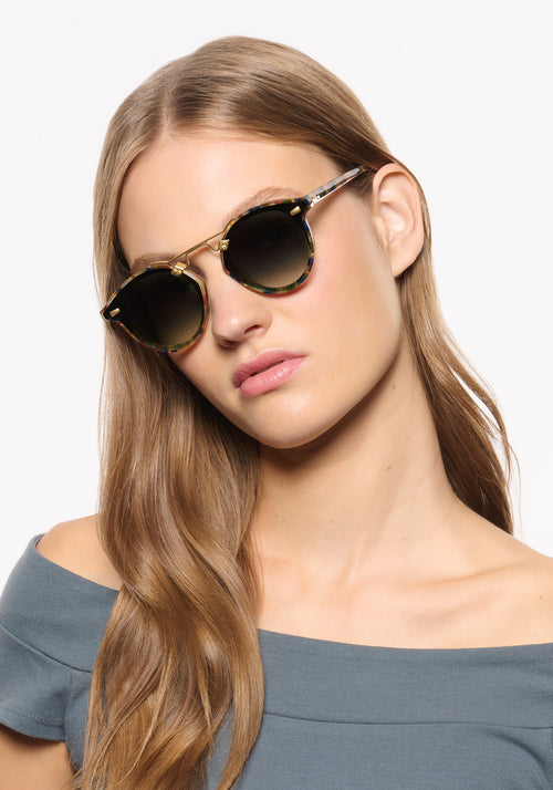 STL NYLON | Tuscan Tortoise 18K Handcrafted, luxury brown tortoise acetate round KREWE sunglasses with flat edge to edge nylon lens and 18k gold metal bridge womens model | Model: Isa
