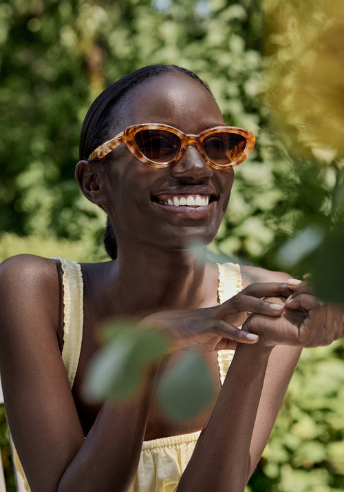 SASHA | Blonde Amaro Handcrafted, luxury brown tortoise acetate bubble cat-eye KREWE sunglasses womens model | Model: Brenda