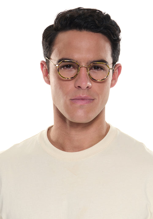SIMON | 12K Titanium + Lynx Handcrafted neutral brown green round geometric titanium and acetate KREWE eyeglasses mens model | Model: Conrado