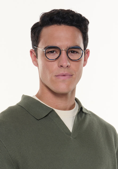 SIMON | Silver Titanium + Wake Handcrafted blue tortoise round geometric titanium and acetate KREWE eyeglasses mens model | Model: Conrado