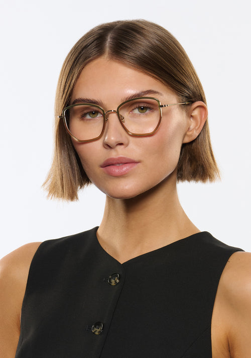 SKYLAR | 12K Titanium + Wasabi Handcrafted, luxury green to neutral gradient acetate and titanium medium sized butterfly KREWE eyeglasses womens model | Model: Michelle