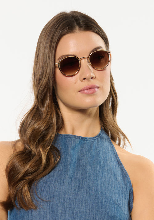 TATE | Aquamarine Tortoise 18K Handcrafted, luxury blue and brown tortoise acetate and stainless steel small round KREWE sunglasses womens model | Model: Kennidy