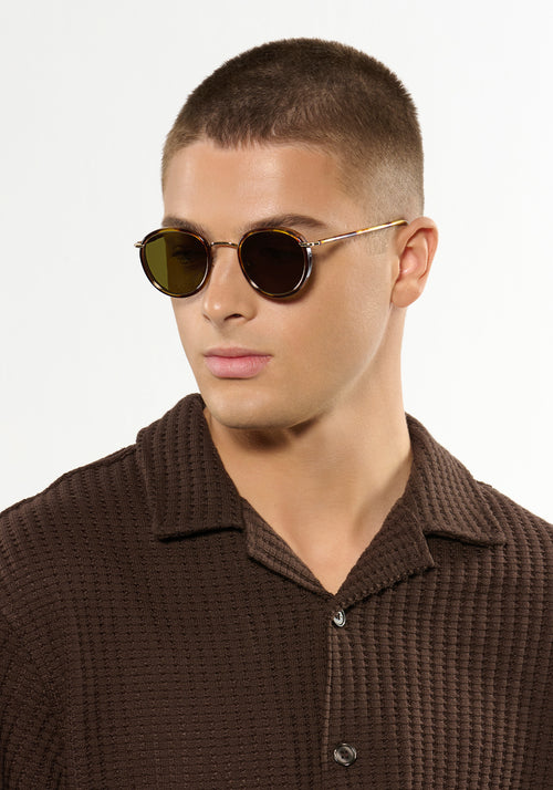 TATE | Havana 12K Polarized Handcrafted, luxury brown tortoise acetate and stainless steel small round KREWE sunglasses mens model | Model: Joey