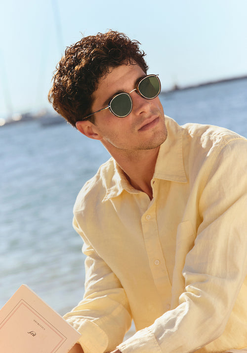 TATE | Havana 12K Polarized Handcrafted, luxury brown tortoise acetate and stainless steel small round KREWE sunglasses mens model | Model: Mateo