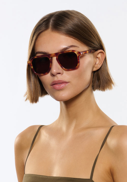 ZANDER | Hawksbill Handcrafted, luxury brown and tan tortoise acetate large rectangular aviator KREWE sunglasses womens model | Model: Michelle