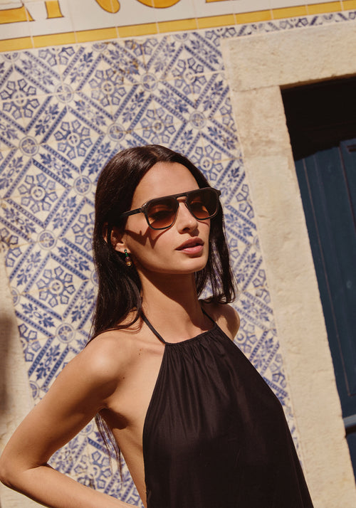 ZANDER CHROMA | Gunmetal Chroma + Black Tea Handcrafted, luxury dark brown polished chrome stainless steel large square aviator KREWE sunglasses womens model | Model: Patricia
