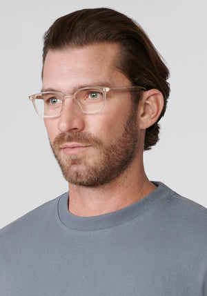 KREWE CARLYLE | Buff Handcrafted, luxury clear acetate eyeglasses mens model | Model: Zach