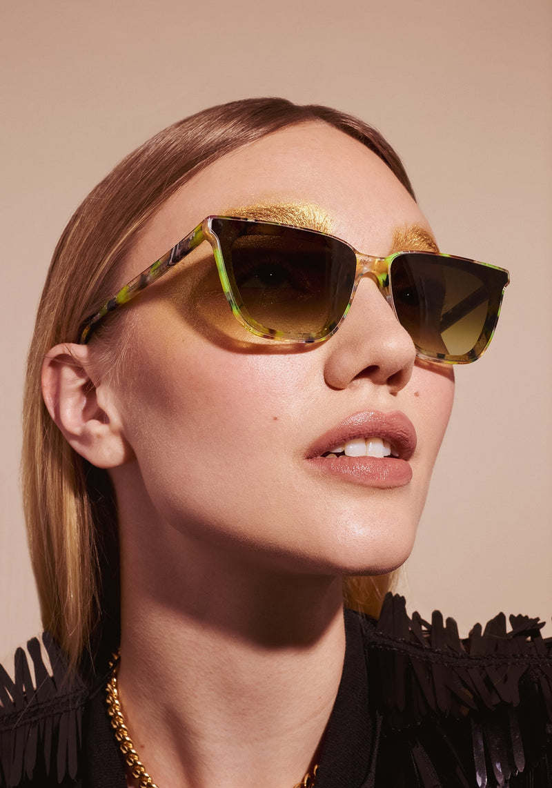 BOWERY NYLON | Revelry Handcrafted, luxury multicolored cat-eye Mardi Gras acetate KREWE sunglasses womens model campaign | Model: Juliette