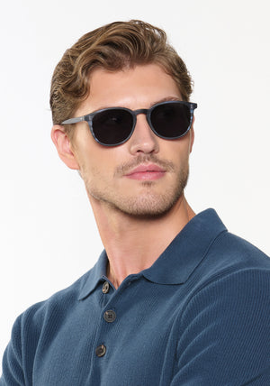 ALVIN | Matte Wake Handcrafted, dark blue tortoise acetate large round wayfarer KREWE sunglasses mens model | Model: Linus