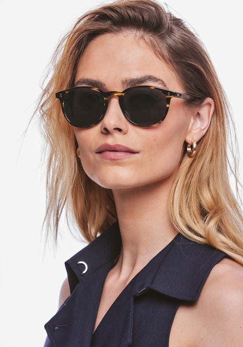 ALVIN | Oak Handcrafted, luxury dark brown and tan tortoise acetate large round wayfarer KREWE sunglasses womens model | Model: Meghan