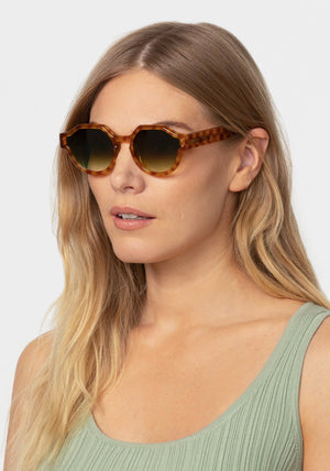 ASTOR | Fernet Handcrafted, luxury brown checkered acetate round geometric KREWE sunglasses womens model | Model: Maritza