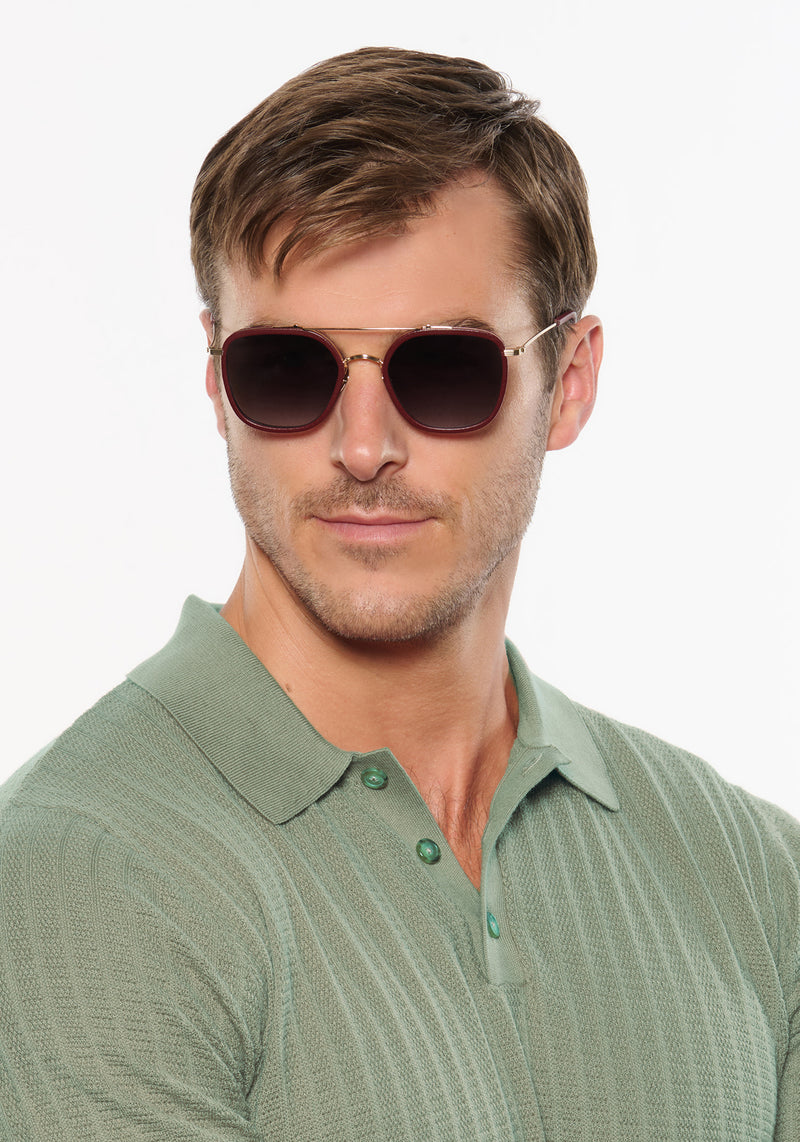 AUSTIN | 12K Titanium + Burgundy Leather Handcrafted, luxury burgundy leather and titanium aviator KREWE sunglasses mens model | Model: Dusty