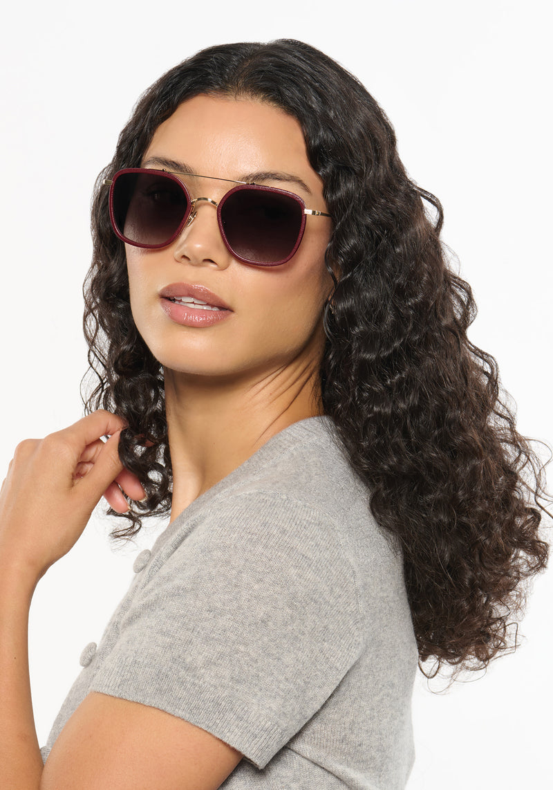 AUSTIN | 12K Titanium + Burgundy Leather Handcrafted, luxury burgundy leather and titanium aviator KREWE sunglasses womens model | Model: Jessika