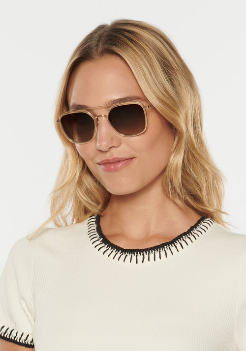 AUSTIN | Champagne 18K Titanium Polarized Handcrafted, Luxury Yellow Acetate KREWE sunglasses womens model campaign | Model: Erica