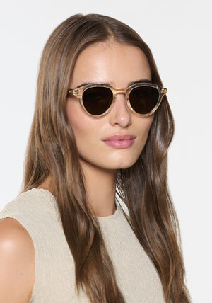 BARRETT | Haze + Iberia Polarized Handcrafted, luxury champagne and brown tortoise acetate round KREWE polarized sunglasses womens model | Model: Sam